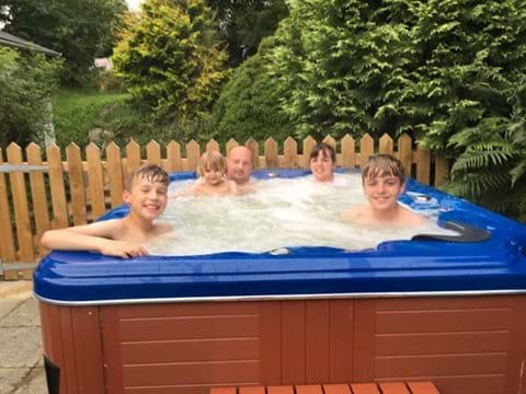 Guests relaxing in the Private Hot Tub