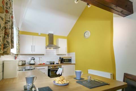 Fully fitted kitchen with breakfast bar