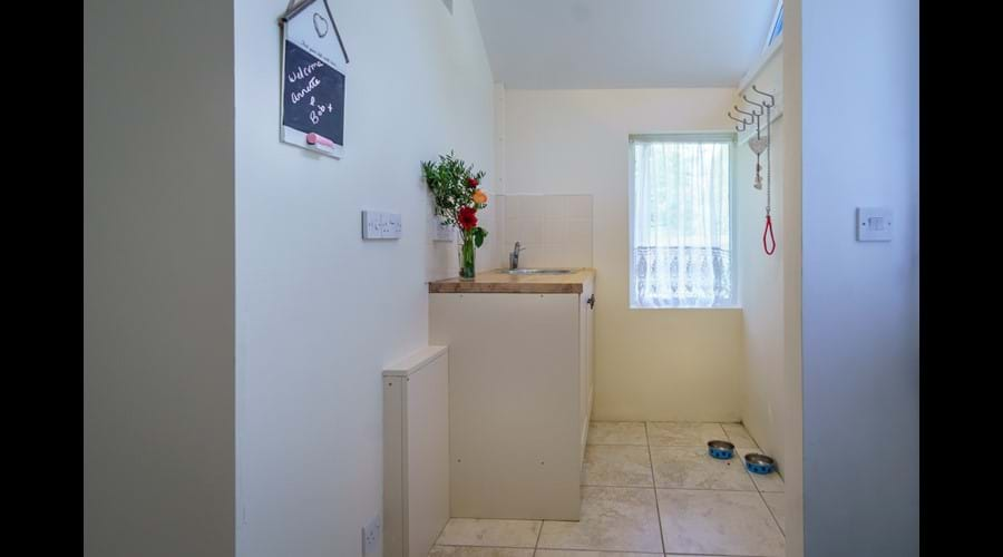 Entrance Foyer with sink... ideal for mucky puppies