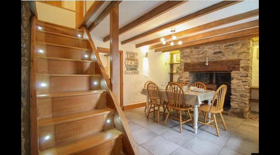Dining room with log burner.