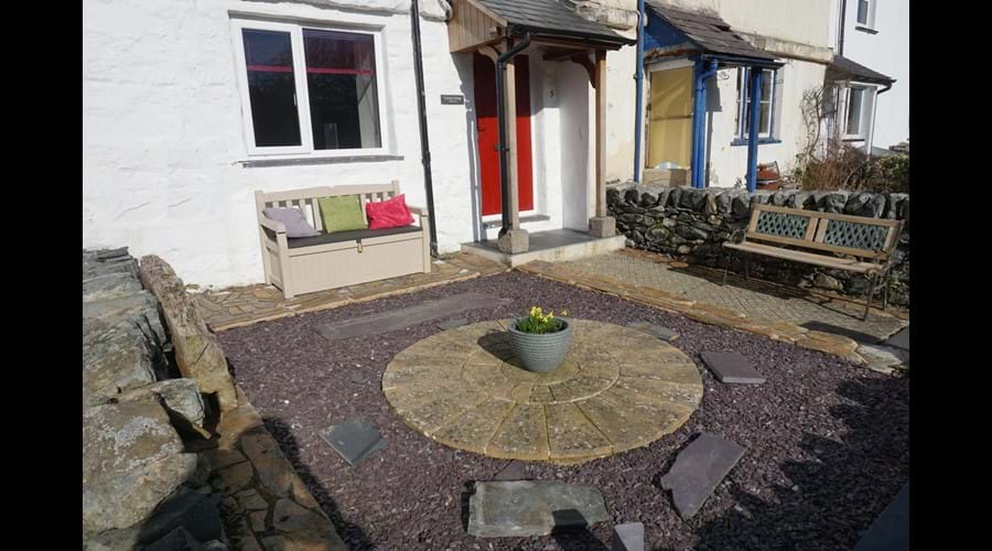Paved garden at the front of the property
