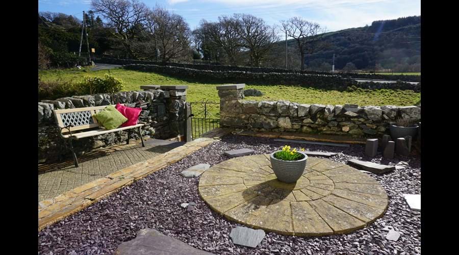 Paved garden at the front of the property