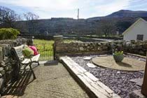 Paved garden at the front of the property