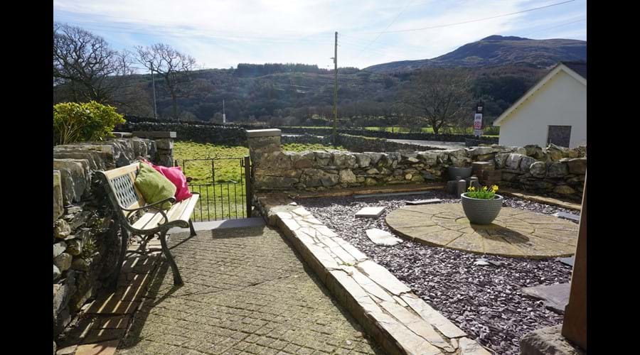 Paved garden at the front of the property