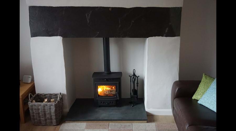 Wood burning stove with original Welsh slate lintel