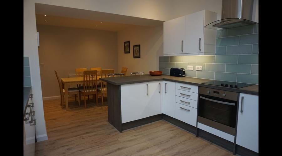 Kitchen leading into dining area