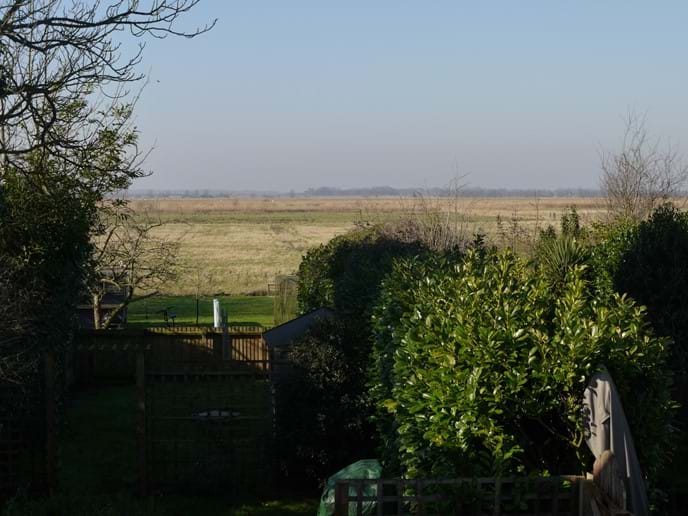 View over garden and marshes