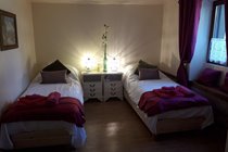 Kingsize Bed in Bedroom 1 separated into singles