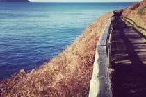 Footpath up to Bradda Head, Port Erin, distant view of the Calf of Man