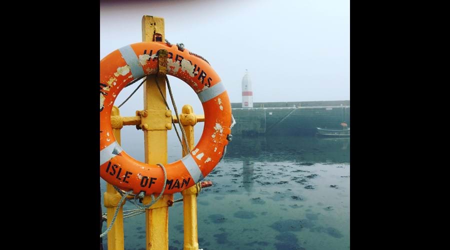 Port St Mary inner harbour on a misty day