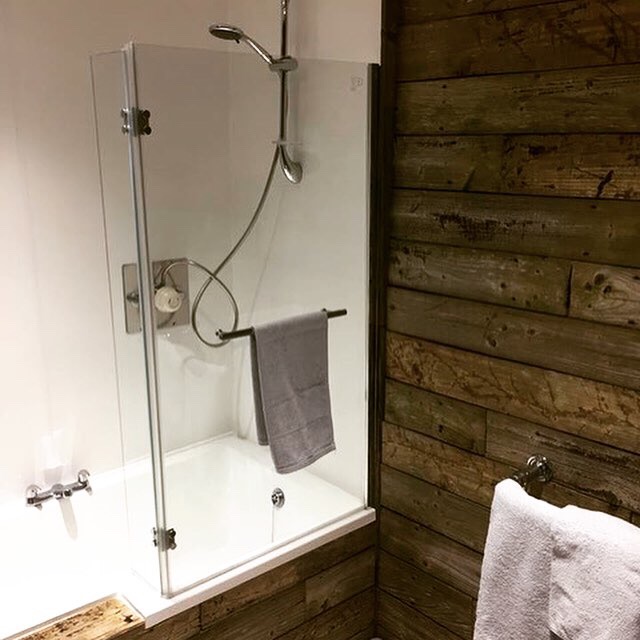 Power shower over bath, Chapel Bay Lodge