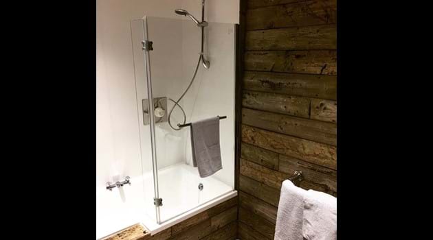 Power shower over bath, Chapel Bay Lodge
