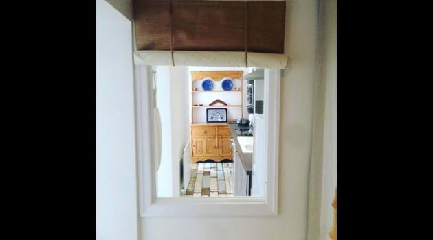Internal window between kitchen and interior hall, Chapel Bay Lodge