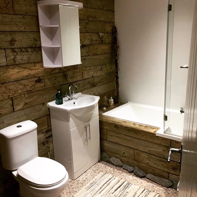 Re-purposed wood-clad bathroom, Chapel Bay Lodge
