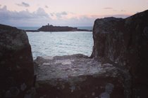 Pink morning skies above Peel Castle