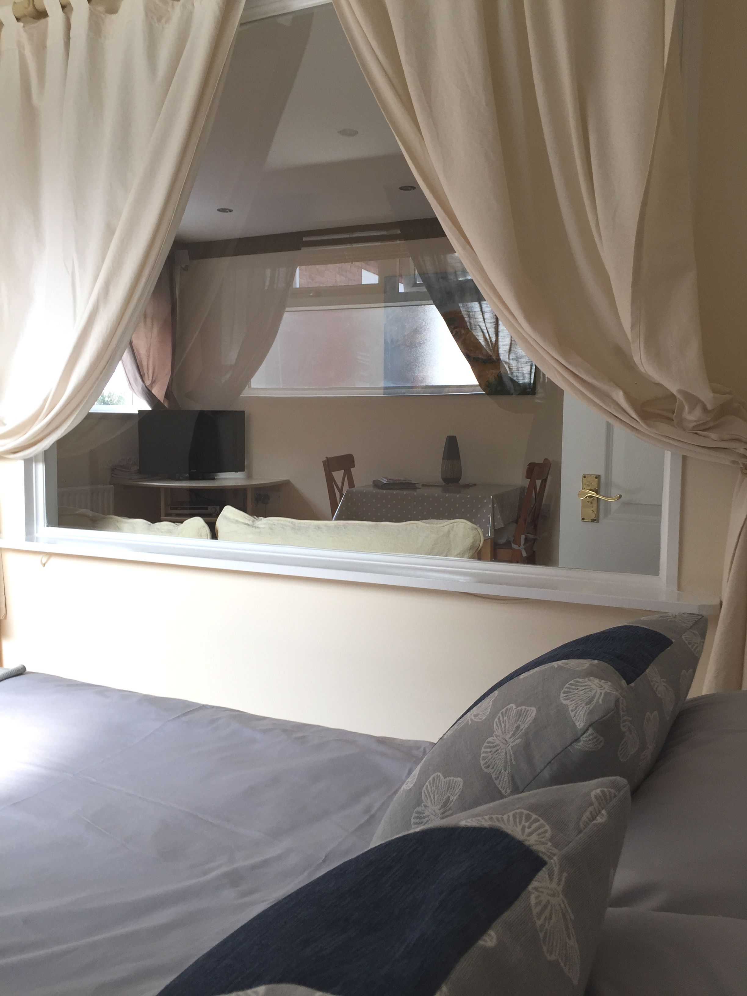 Looking through to lounge from bedroom