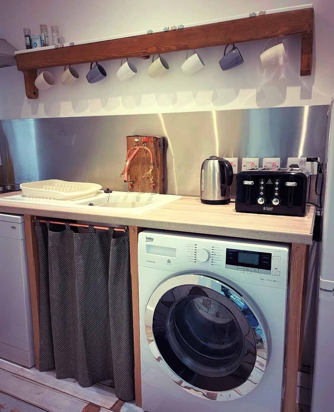 Kitchen showing washing machine