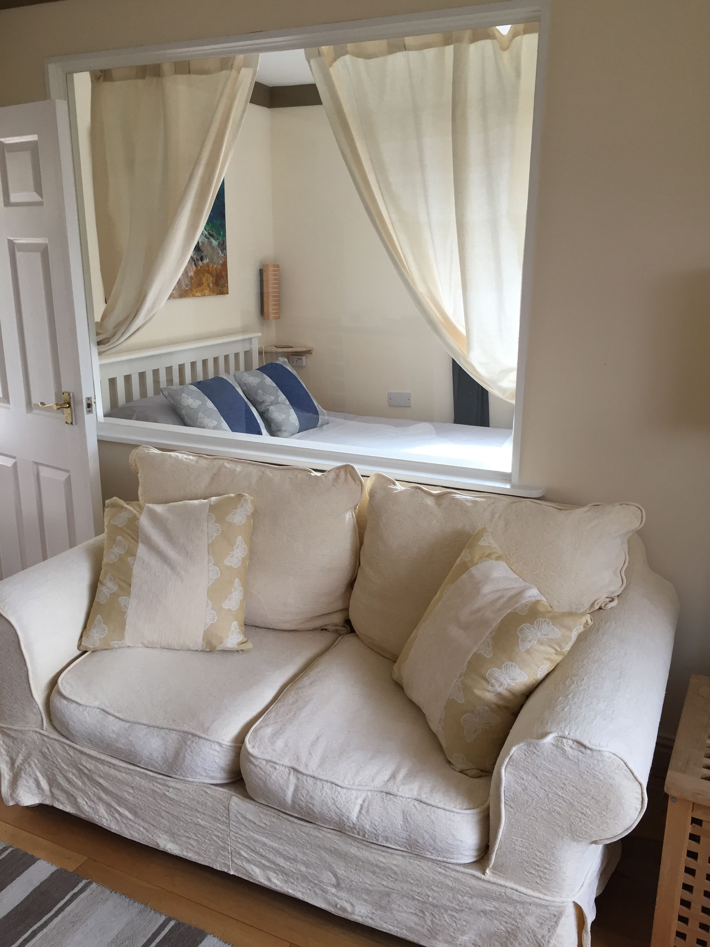 Lounge with view through to bedroom