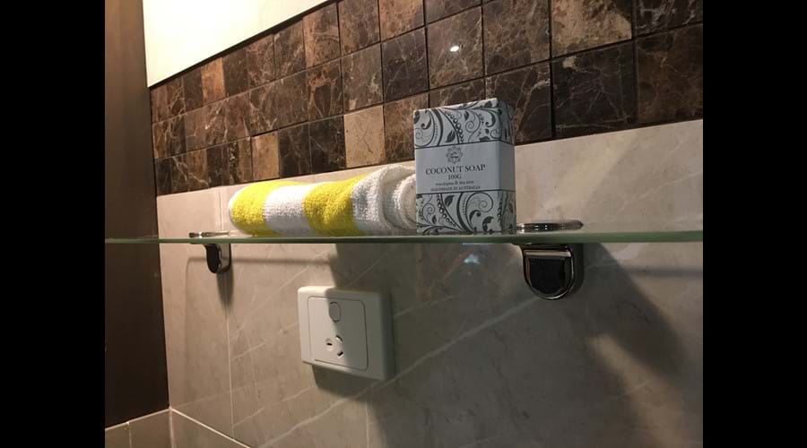 240V outlet for a hairdryer (supplied) or your electric razor.