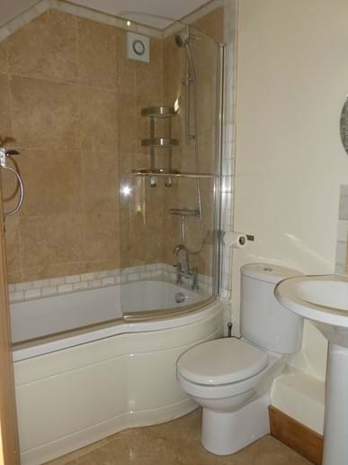 King size en-suite with full size bath and overhead shower