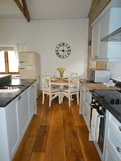 Socialble kitchen/diner with solid oak floors