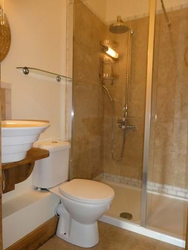 En-suite shower room to single room with luxury massage jet, rainfall shower