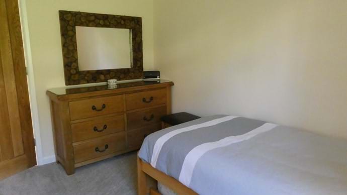 Large chest of drawers in the single room which can be set up as a twin room