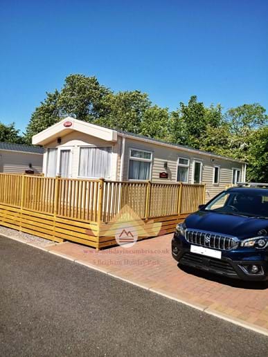 Parking Space for No. 5 is to right of Caravan in front of Decking Steps