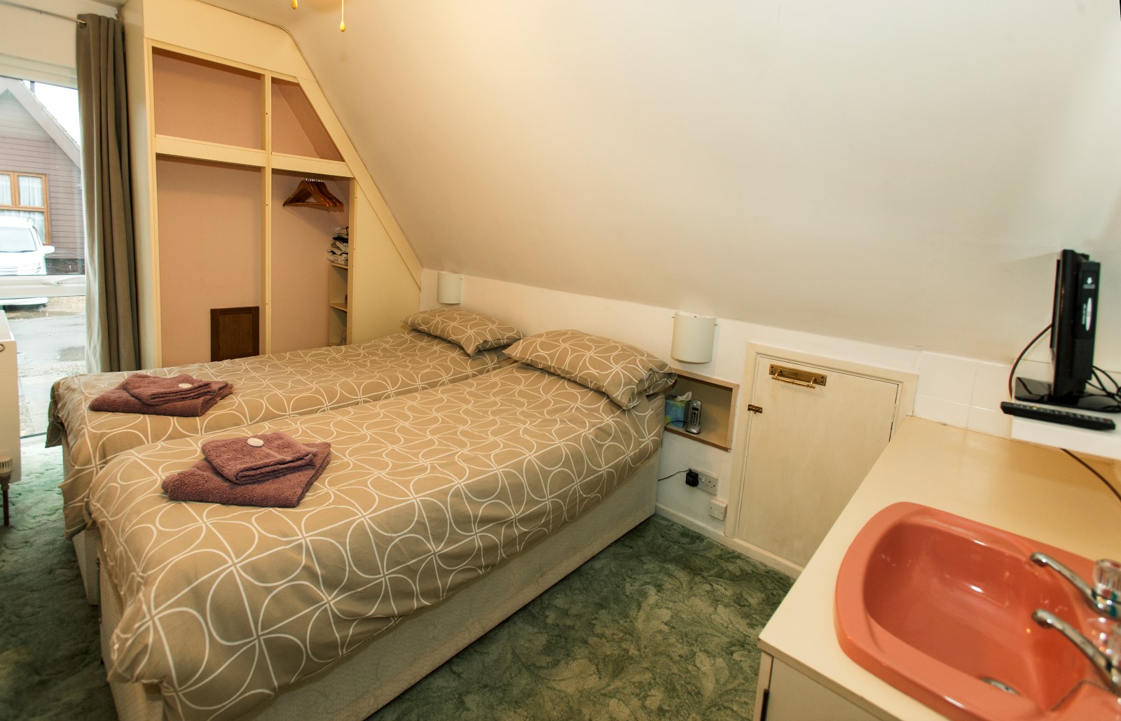 Twin or King beds, storage , sink,  TV , Firestick, central heating