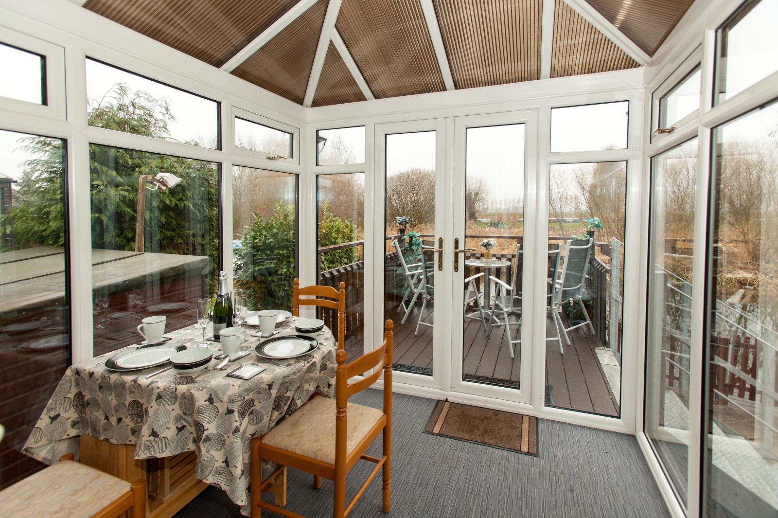 Conservatory -butterfly table with 4 extra chairs