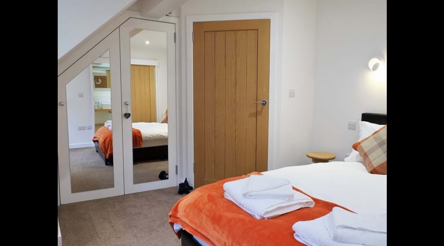 The double room has wall-mounted, over-bed reading lights and bed-side USB charging points.