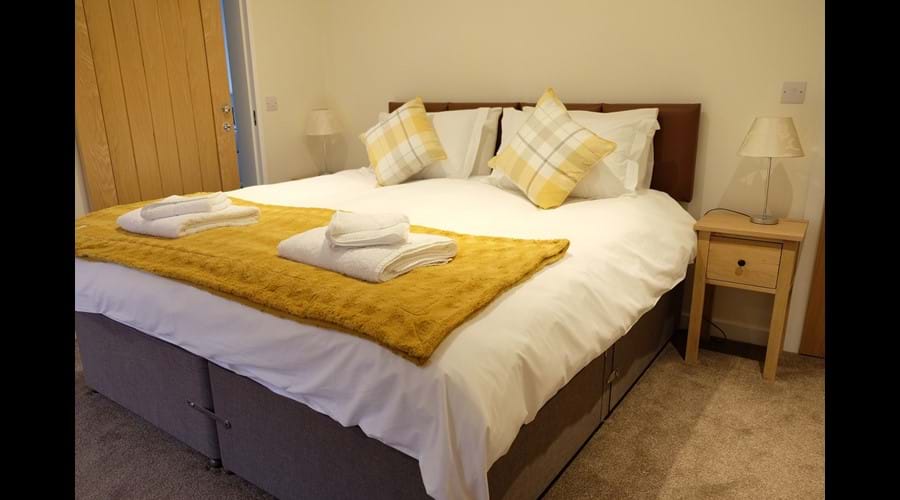 The larger bedroom can be configured as a kingsize double.