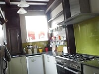 Kitchen with small fridge