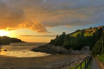 Sunset over Combe Martin Beach