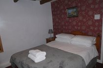 Room 1 (Main pub building) Cosy double en suite with walk in shower