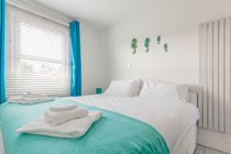 Our teal bedroom has a superking bed that can converted into twin beds