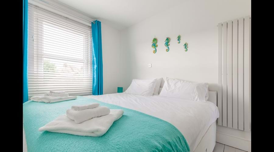 Our teal bedroom has a superking bed that can converted into twin beds