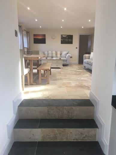 The steps from the kitchen to the lounge 