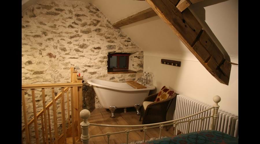 Upstairs Bedroom in Cwch Gwenyn (Beehive) with Roll Top Bath