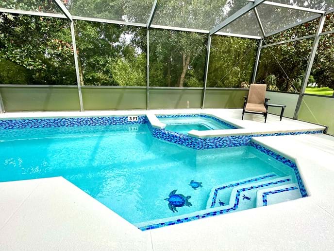 Upgraded Glass Tiles & re-painted pool deck Upgraded Glass Tiles & re-painted pool deck
