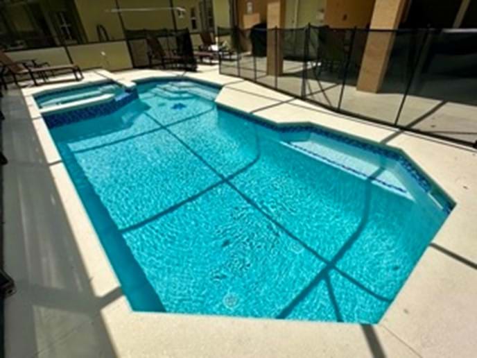 Sunny Pool Deck with Pool Fence & Pool Door alarm for the safety of our younger guests Sunny Pool Deck with Pool Fence & Pool Door alarm for the safety of our younger guests