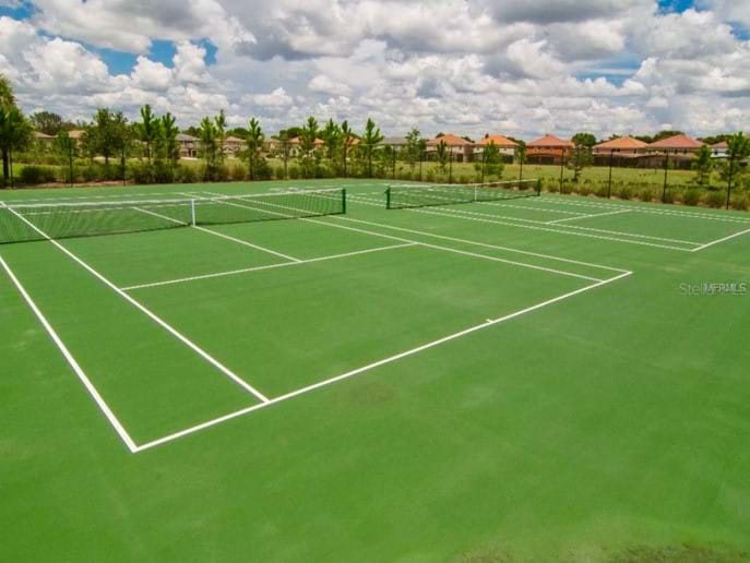 Tennis Courts at Clubhouse & equipment in Villa Tennis Courts at Clubhouse & equipment in Villa