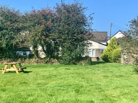 Rear Garden and playing field. Picnic area