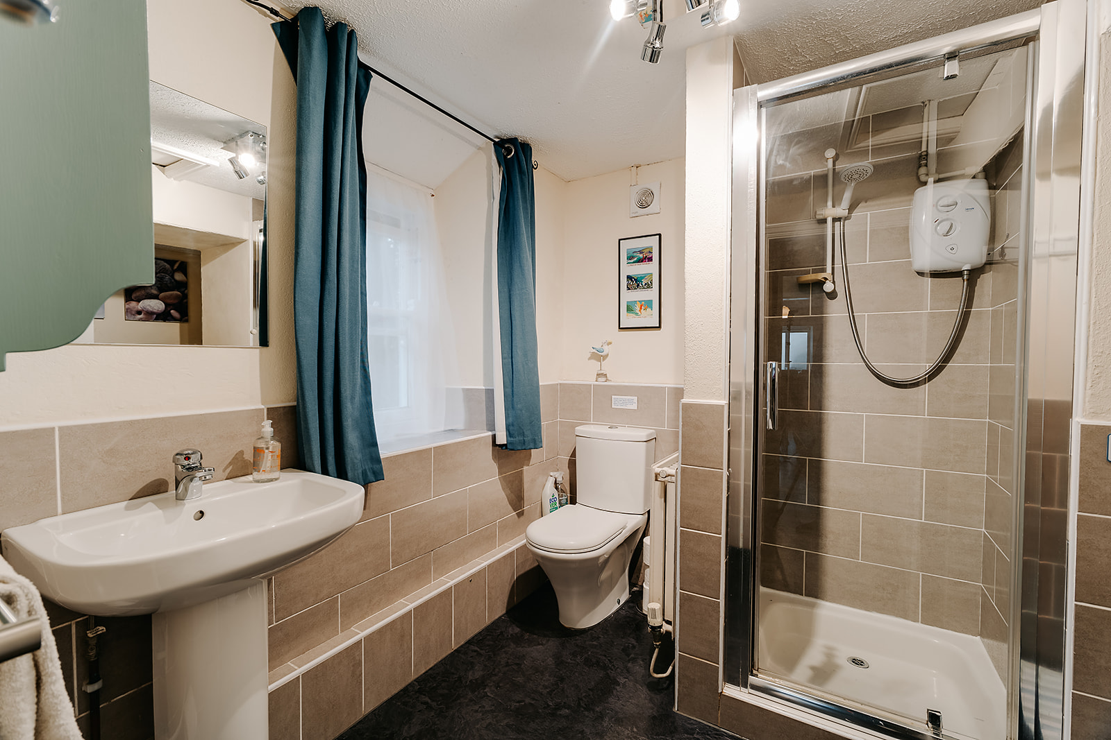 Downstairs bathroom with walk-in shower and separate bath