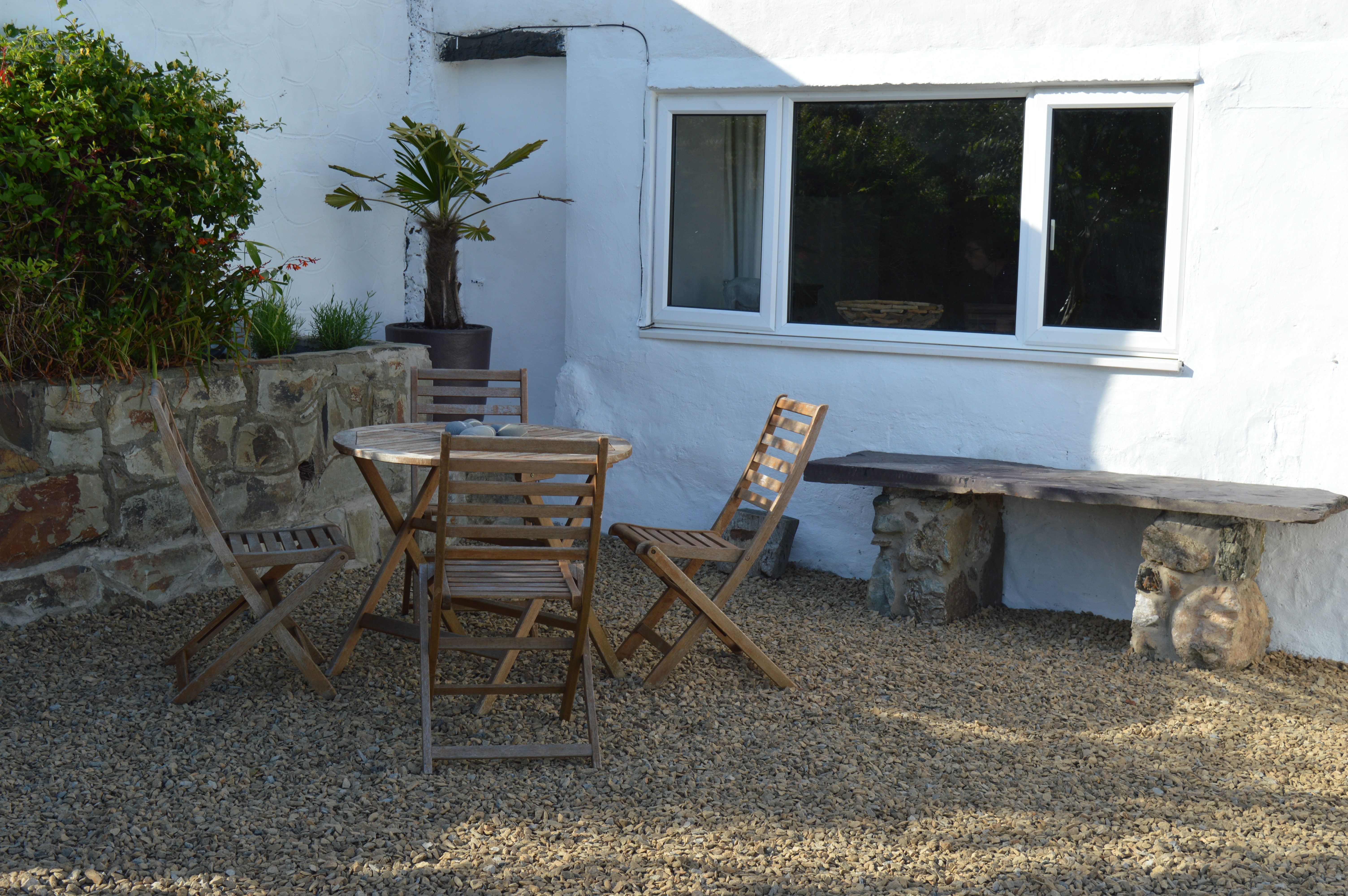 Outside bistrot table to the front of the property - one of several outside seating areas 