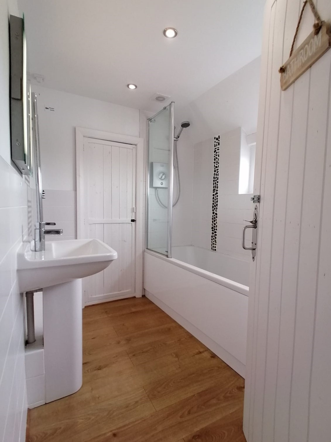 Family bathroom with bath/shower, toilet and washbasin