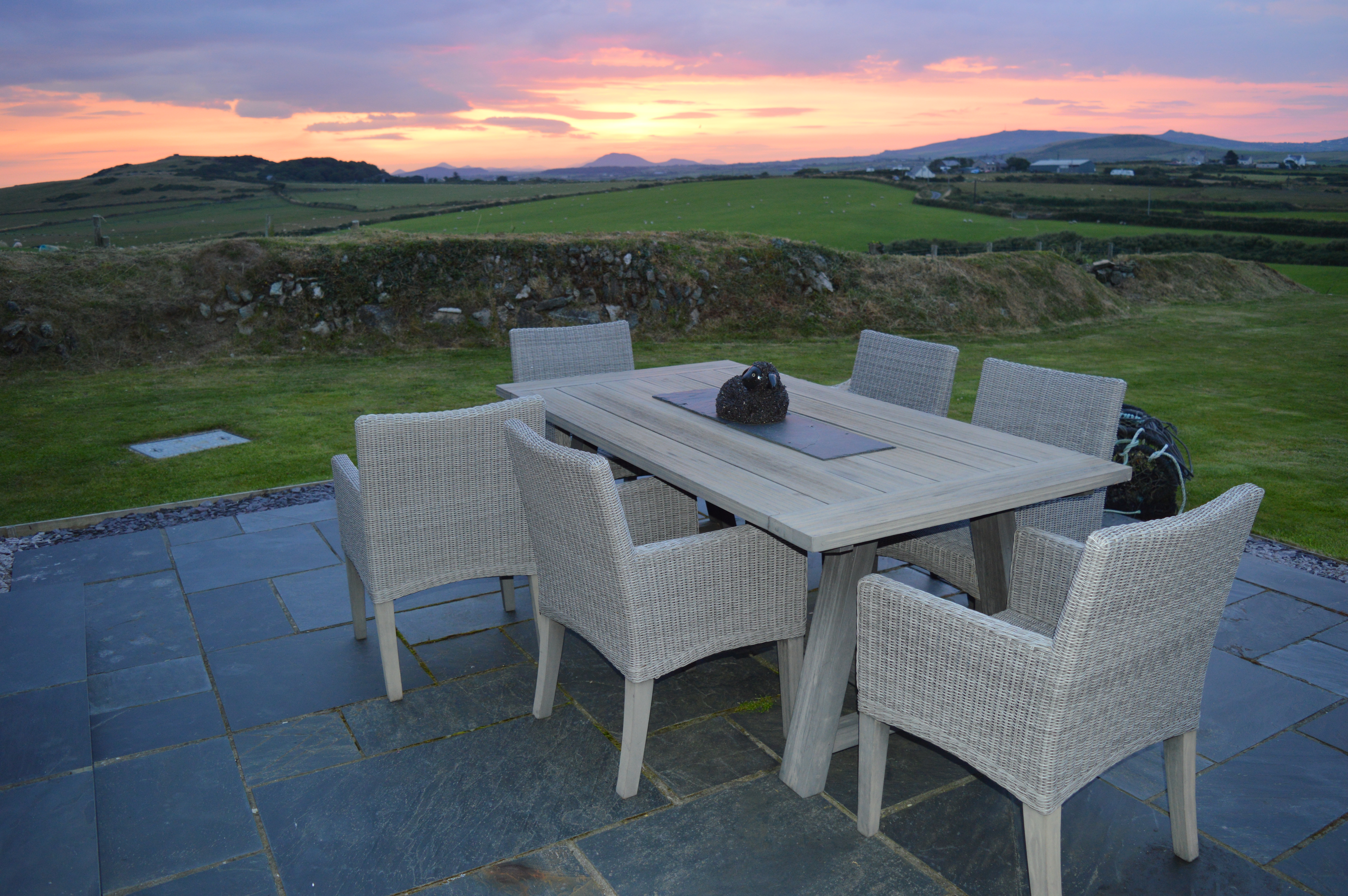 Watch the sunrise from the Breakfast patio and then watch it set from the headland path outside the garden gate