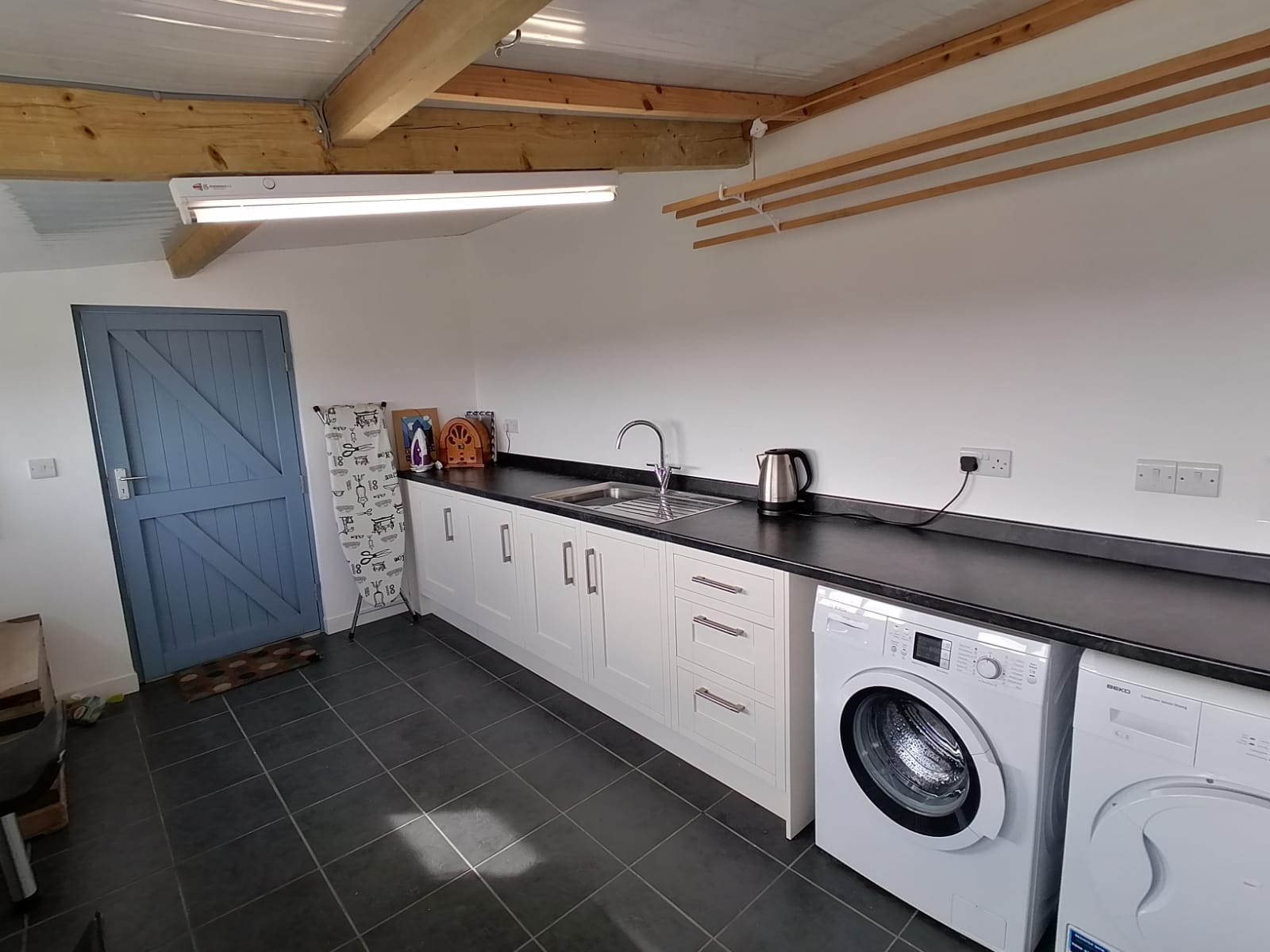 Washer, dryer, iron, ironing board, high chair. Great mountain, countryside and sea views while you do the washing!
