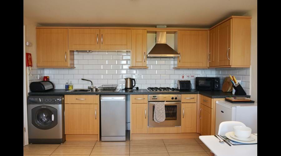 Spacious and well equipped kitchen area