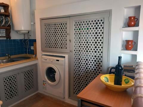 Full Equipped Kitchen with Washing Machine Photo